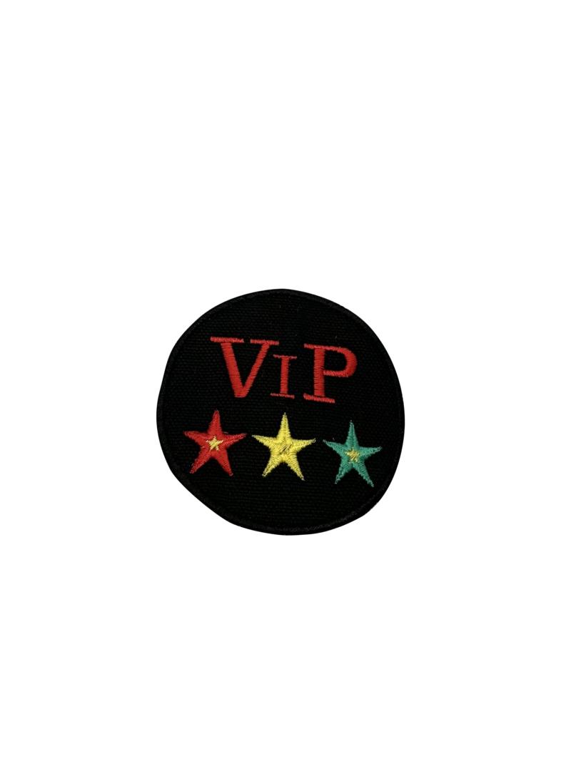 Badge Vip en sterren rood geel en groen